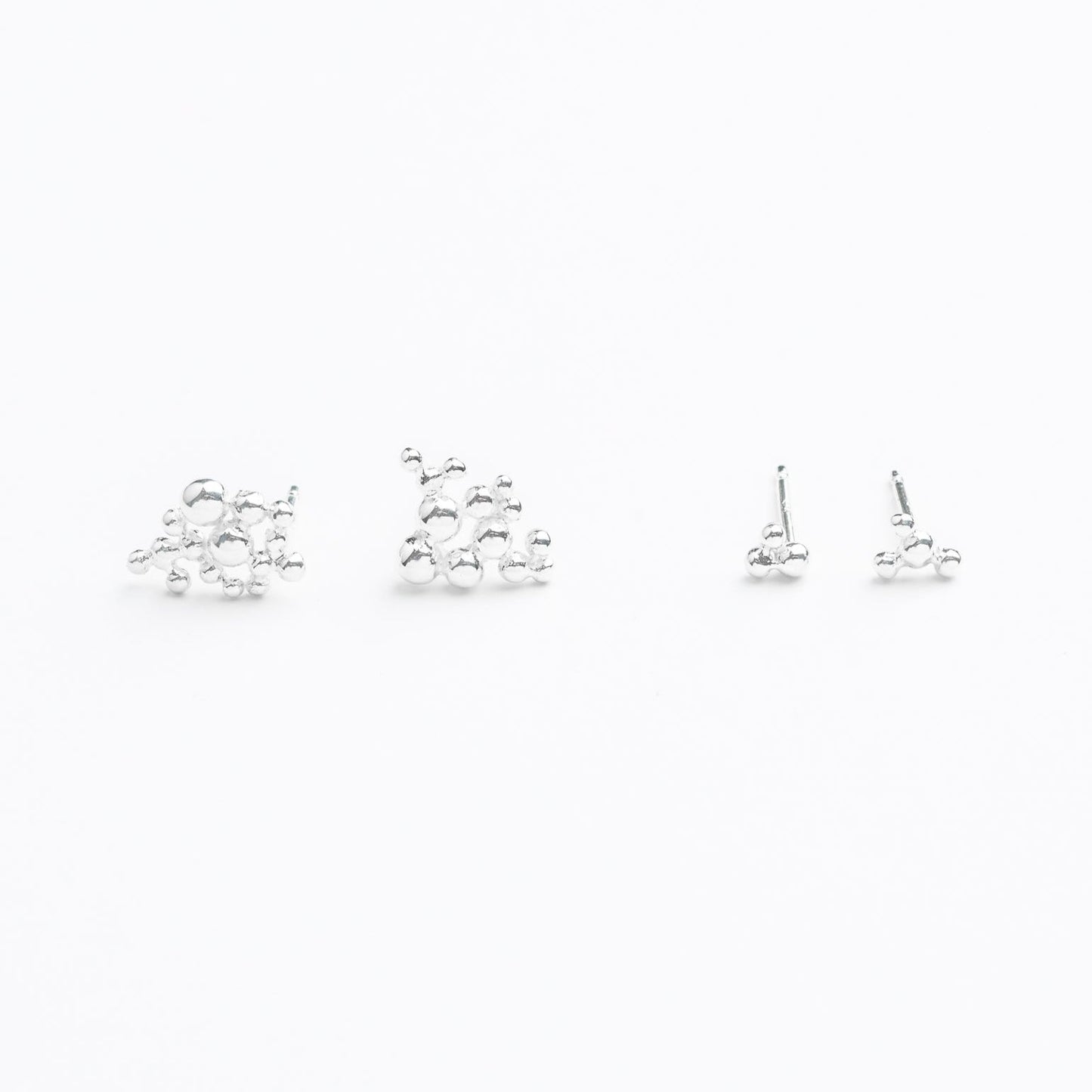 Star-Inspired Asymmetrical Sterling Silver Earrings • Clust